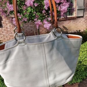 Creme Coach purse with leather handle